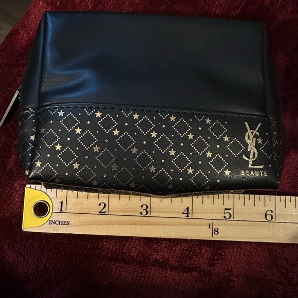 Yves Saint Laurent Handbags - YSL Black and Gold Cosmetic Bag